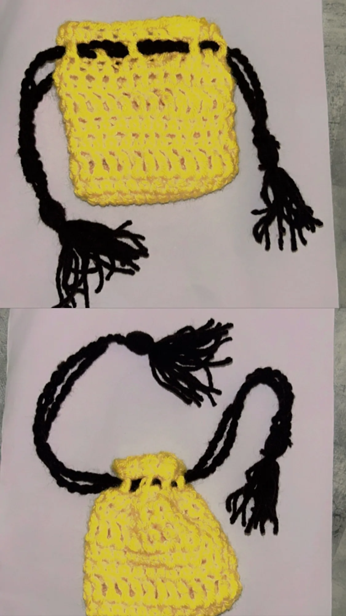 A yellow crochet drawstring pouch with black ties