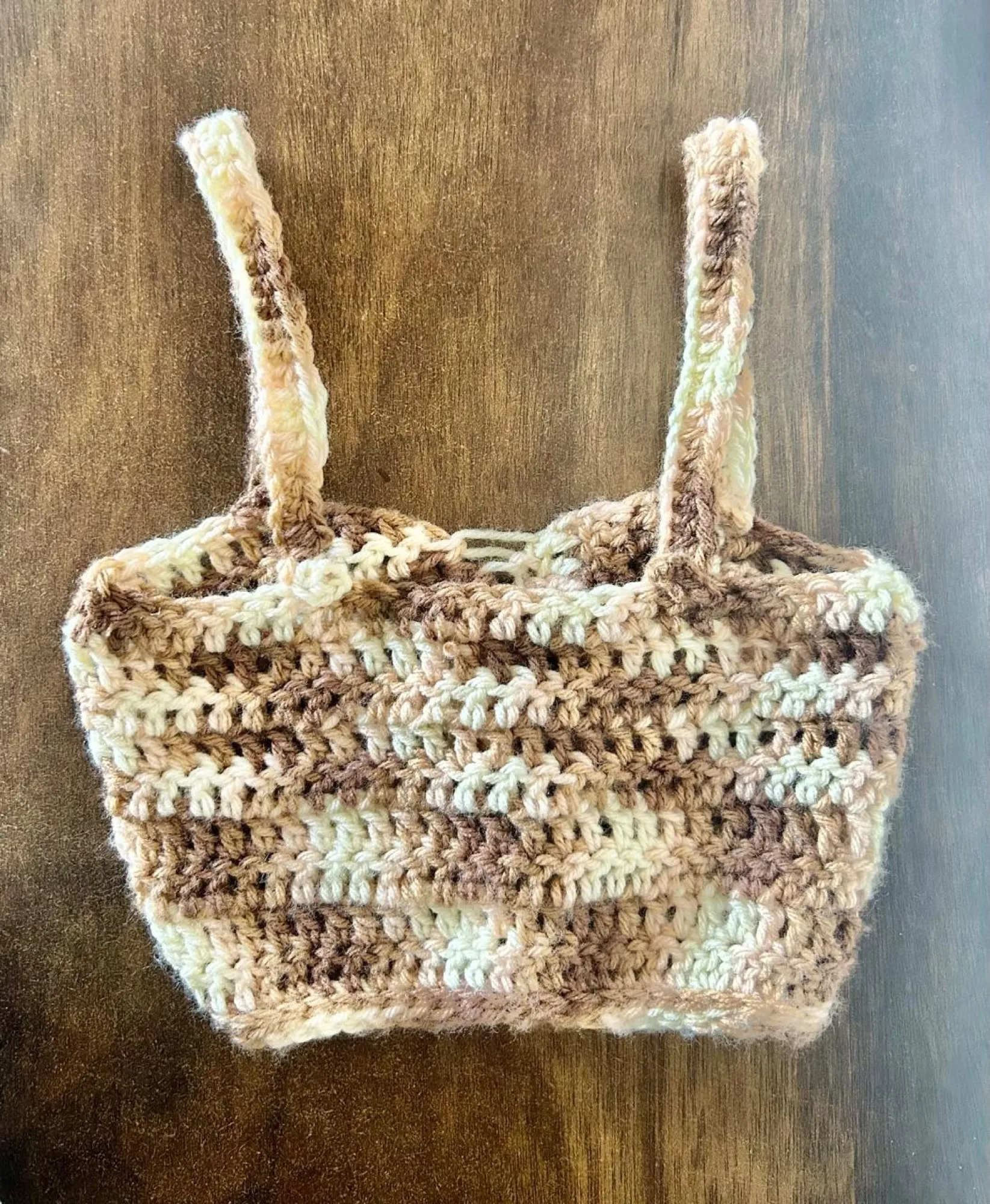 A caramel crochet patchwork purse